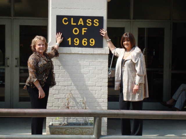 Susan Driver White and Margie Mays Lester standing in front of JHS