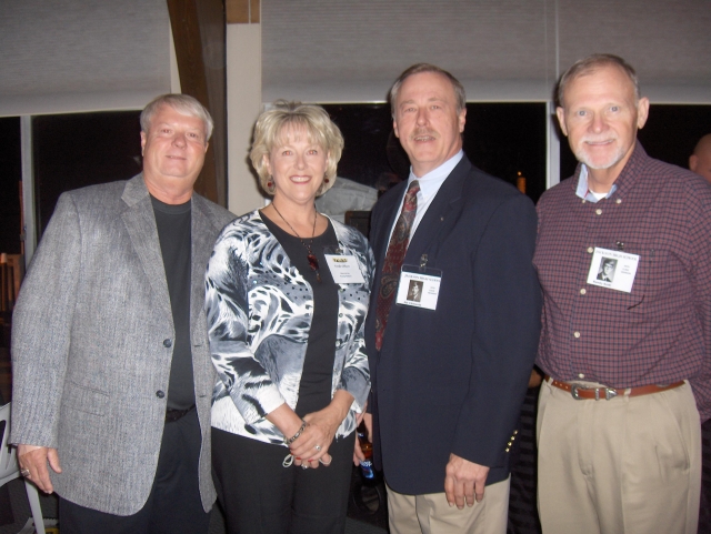 Rusty Gilbert and his wife Gayle Driver Gilbert, Joe Clements and Randy Scott at the Reunion Dinner